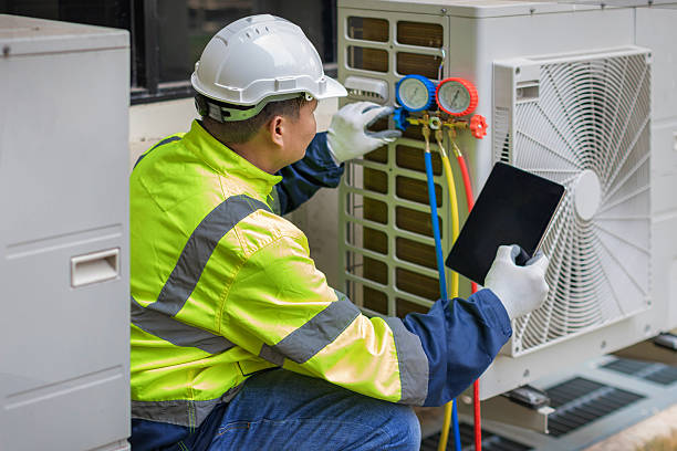 Professional Air Conditioning Repair technician working in DeKalb, IL